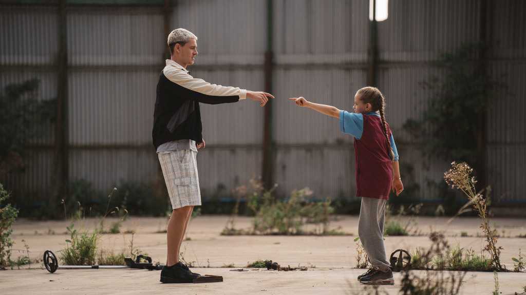 A film still from Scrapper featuring Harris Dickinson and Lola Campbell. Courtesy of Kino Lorber