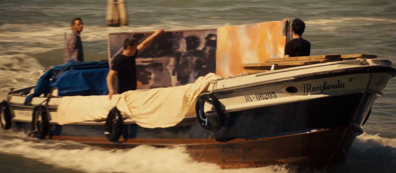 Recreation of the 1964 transport of Robert Rauschenberg’s work in Venice canals for exhibition at the Venice Biennale, as seen in TAKING VENICE, a film by Amei Wallach. A Zeitgeist Films release in association with Kino Lorber.