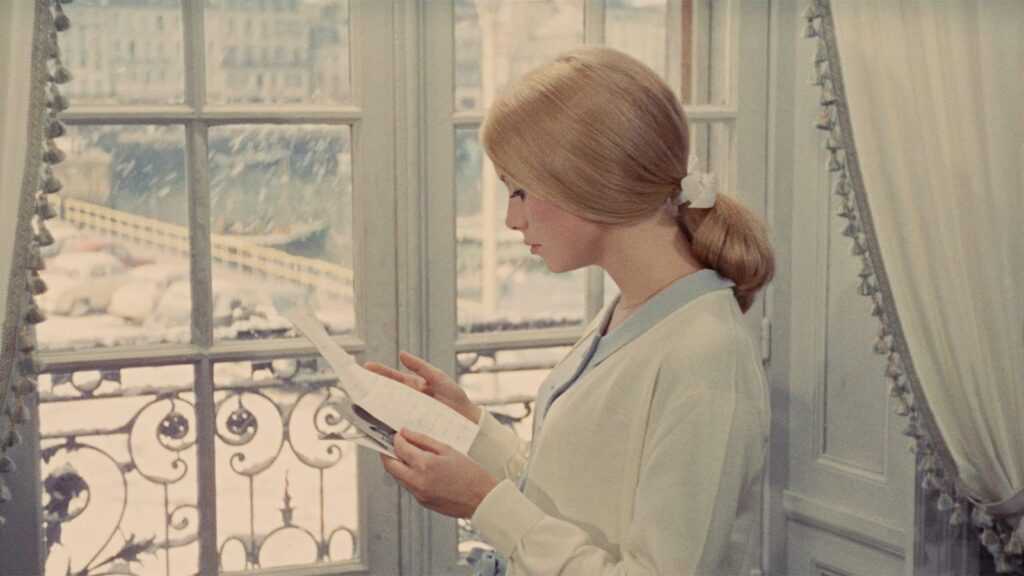 Catherine Deneuve in a still from Jacques Demy's The Umbrellas of Cherbourg